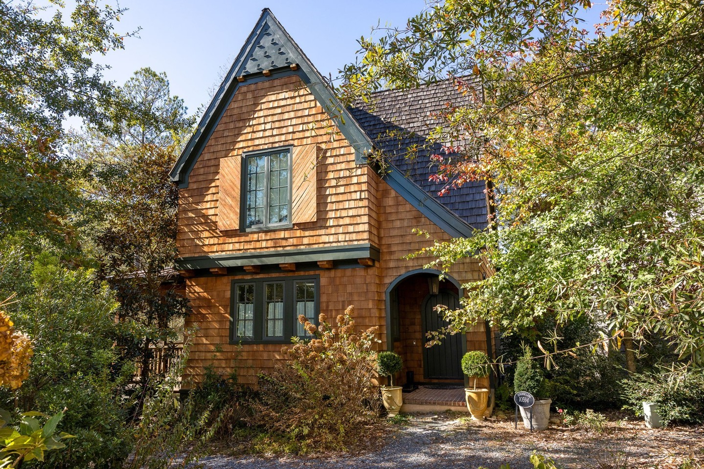 💥 This incredibly charming 3-bed 3.5-bath cottage in the Grange hamlet of Serenbe is UNDER CONTRACT! This picturesque home is a tranquil escape surrounded by the beauty of nature and walkable to everything Grange has to offer including The General Store, Hills & Hamlets Bookshop, Serenbe Farms, and miles of nature trails! We love the the expansive back porch overlooking private wooded views and the terrace level with its own kitchen, living area + bedroom. ⁠
⁠
👀 See more homes in the Grange hamlet by tapping the link in our bio and tapping this post!