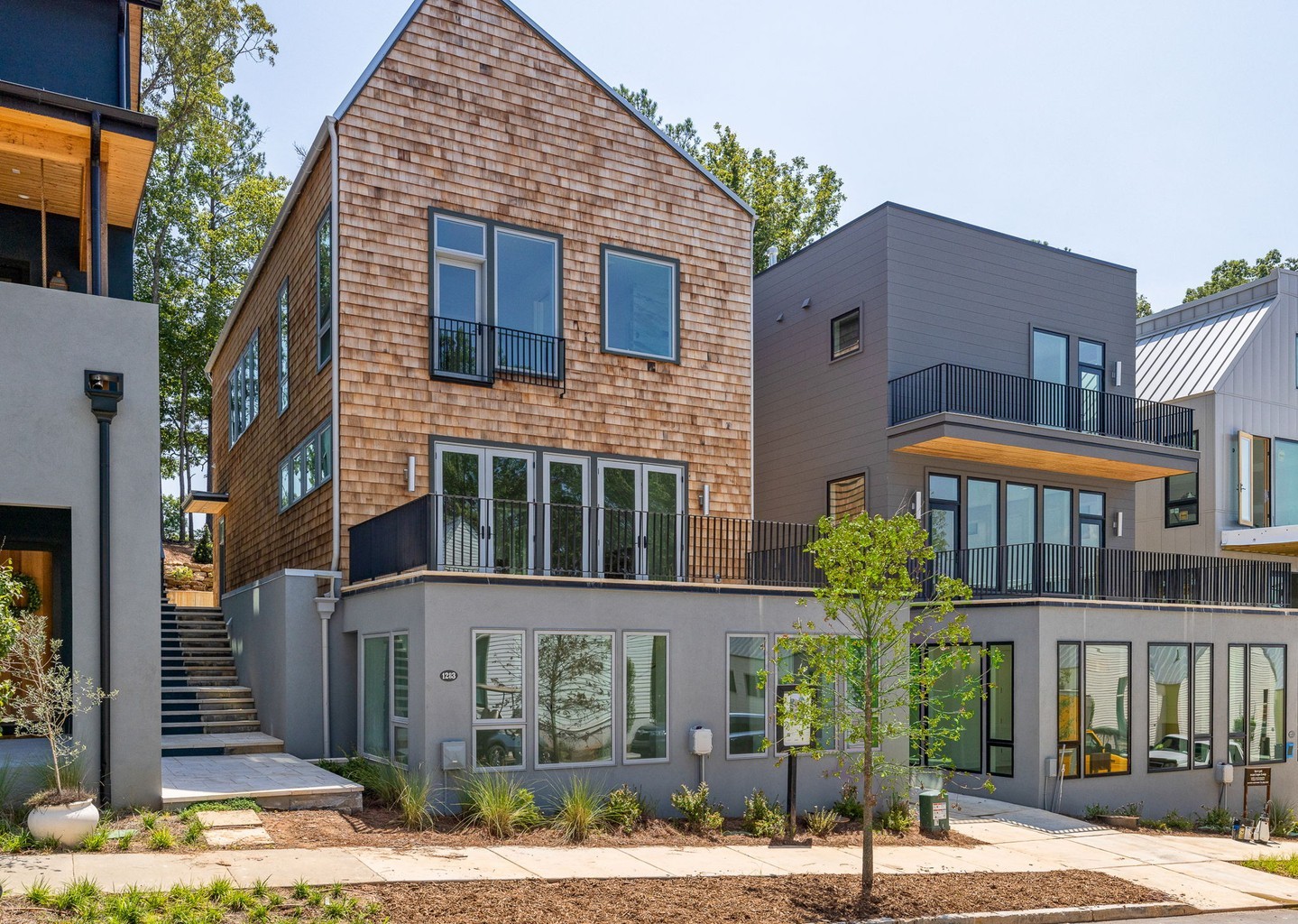 This gorgeous home built by 1023 Construction on Lupo Loop in the Mado hamlet of Serenbe is UNDER CONTRACT! 🎉 Lupo Loop is not only walkable to everything the Mado hamlet has to offer, but the new trail off Lupo Loop that winds past the Horse Stables 😍🐴 makes Lupo Loop also walkable to the Grange hamlet!⁠
⁠
😌 Mado: Gym, Spa, Yoga, Serenbe Pool, Creek Retreat, Bamboo Juices, Halsa restaurant, Minro Studio, Nigel's Bananas and Gelato, Radical Dough, and more!⁠
⁠
🥬 Grange: Serenbe Farmers Market, Serenbe Farms, The General Store, Hills & Hamlets Bookshop, The Stables, and the Grange Green.⁠
⁠
Did you know that over 60% of adults in the US report feeling lonely? That’s why in addition to building with nature in mind, Serenbe is designed to be walkable and make it effortless for people to be able to connect more with nature and each other.⁠
⁠
See homes available on Lupo Loop at the 🔗 in our bio!