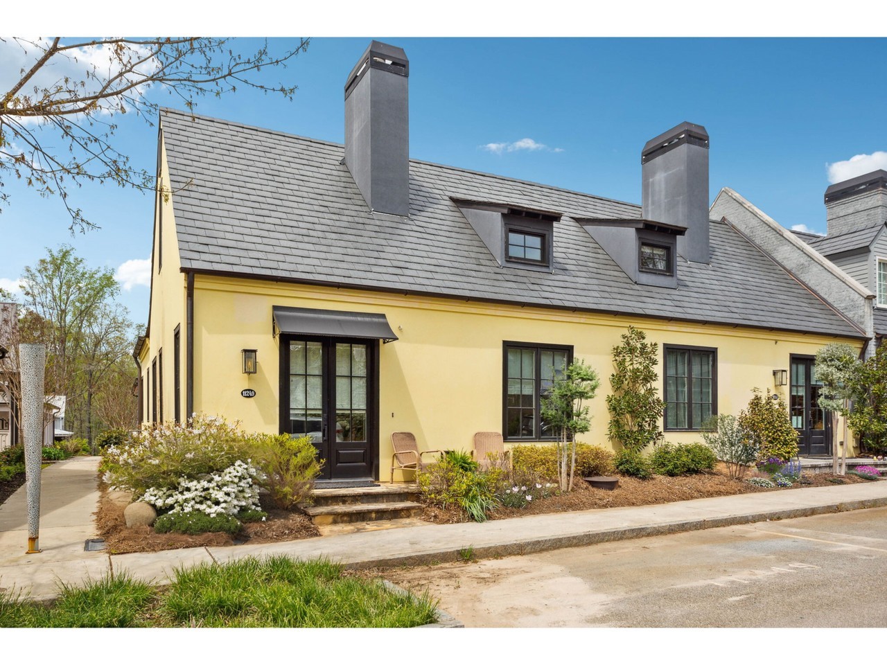 This gorgeous Mado cottage is CLOSED!💥 It went under contract after being on the market for only 6 days! Every corner of this home is so dreamy! We adore the cozy fireplace, open floor plan with vaulted ceilings, natural night, upstairs loft space perfect for a second living room, home office, or a guest bedroom! The large walk-in attic on loft level is perfect for extra storage. Finally, we can't get enough of the gorgeous screened in porch with plenty of shelving for plants. ⁠
⁠
🌿 Contact us to find your perfect Serenbe home!