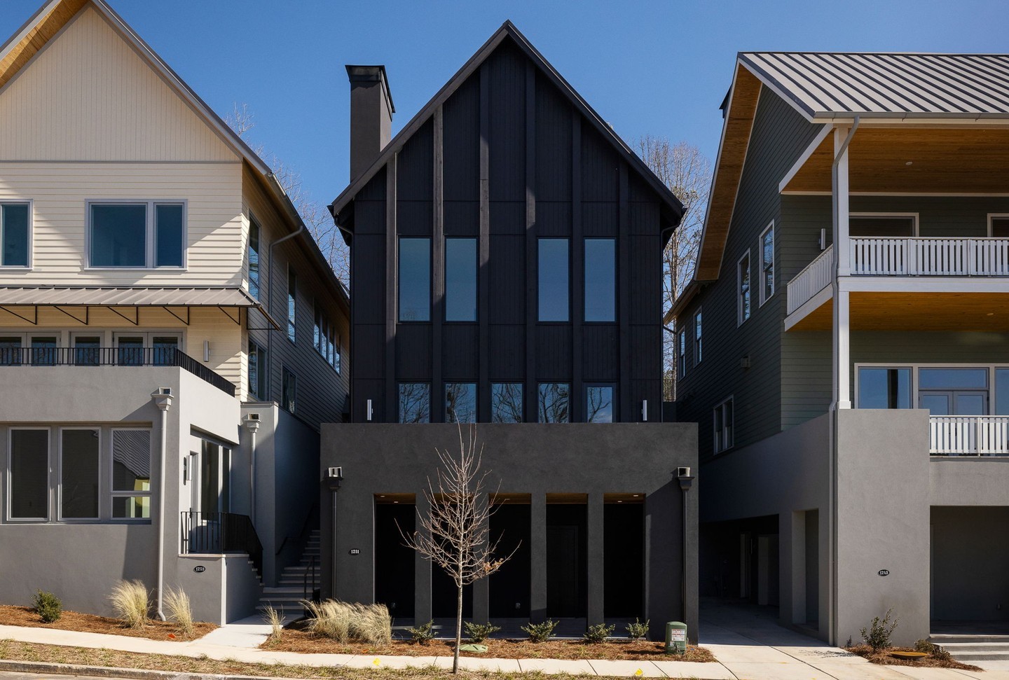 This gorgeous all black cottage on Lupo Loop is Under Contract!! 🎉 We are so excited to see how our clients decorate this stunning home and make it their own. 🖤 This home features 3 open air patios, floor-to-ceiling windows, spacious open floor plan, a cozy living room fireplace, a two car garage, and a Primary bedroom on second level with its own private patio off the back of the house with treetop views, sounds of nature, and immediate access to nature trails!⁠
⁠
🌾 We can’t decide what we love most about life on Lupo Loop. Sunset Point, the hidden trampoline, the new trail winding through the horse stables to the Farmers Market, walkability to shops and restaurants, or this dream house (Lot 519) built by @1023Construction !!⁠
⁠
👀 See more homes available on Lupo Loop by tapping this post in the link in our bio!